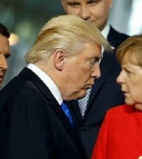 خلاف المناخ بين ترامب وميركل في قمة العشرين